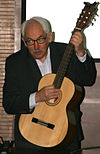 Peter Grünberg playing guitar.jpg