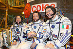 Soyuz TMA-20 Crew in front of the capsule.jpg