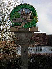 Dorfschild von Henham mit Drachendarstellung