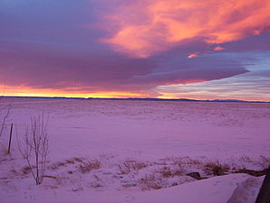 Verschneiter Sonnenuntergang in Laramie